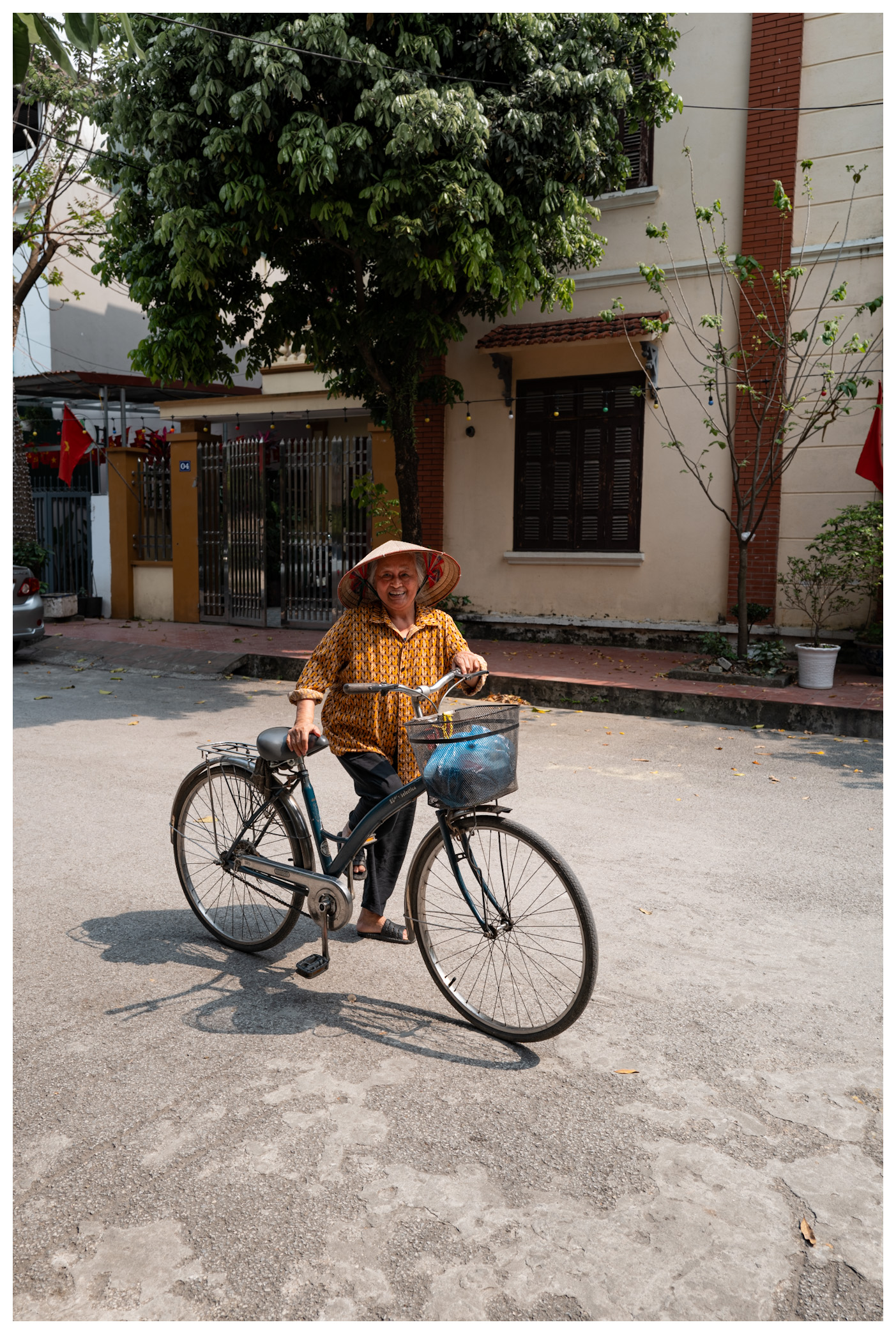 Lady on a bicycle in Hoa Lu